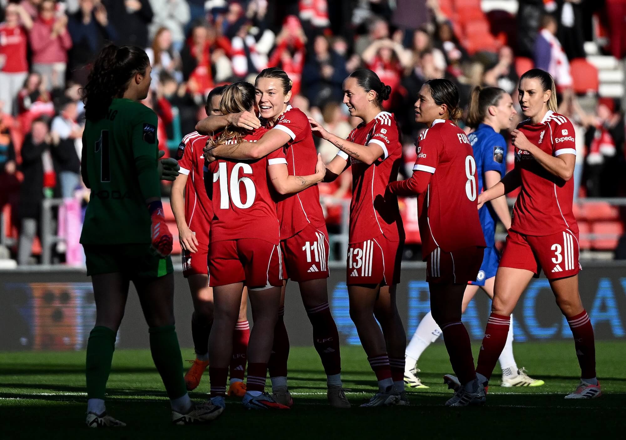 Liverpool FC Women's team celebrating together